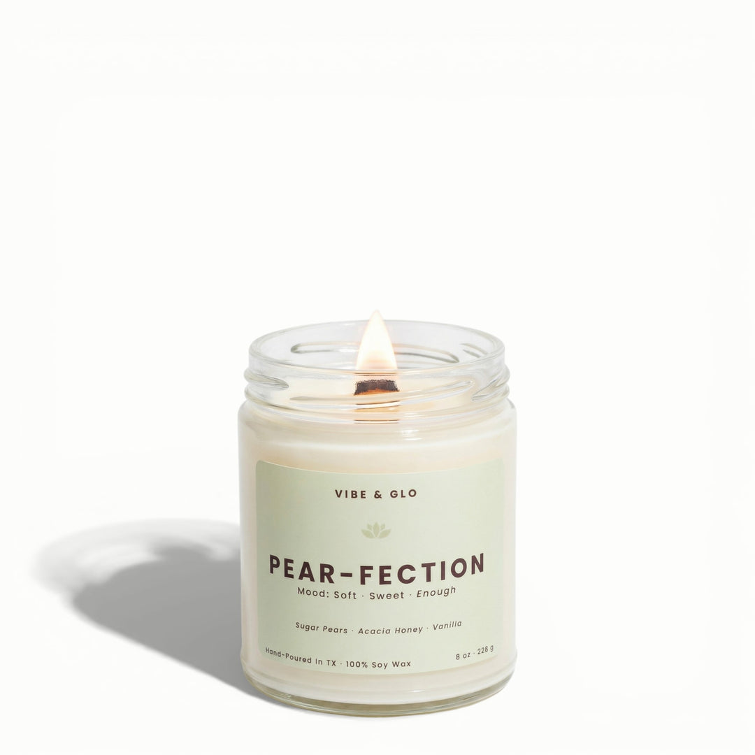 Pear-Fection wooden wick soy candle by Vibe & Glo with sugar pear, acacia honey, and vanilla in clear 8 oz glass jar.