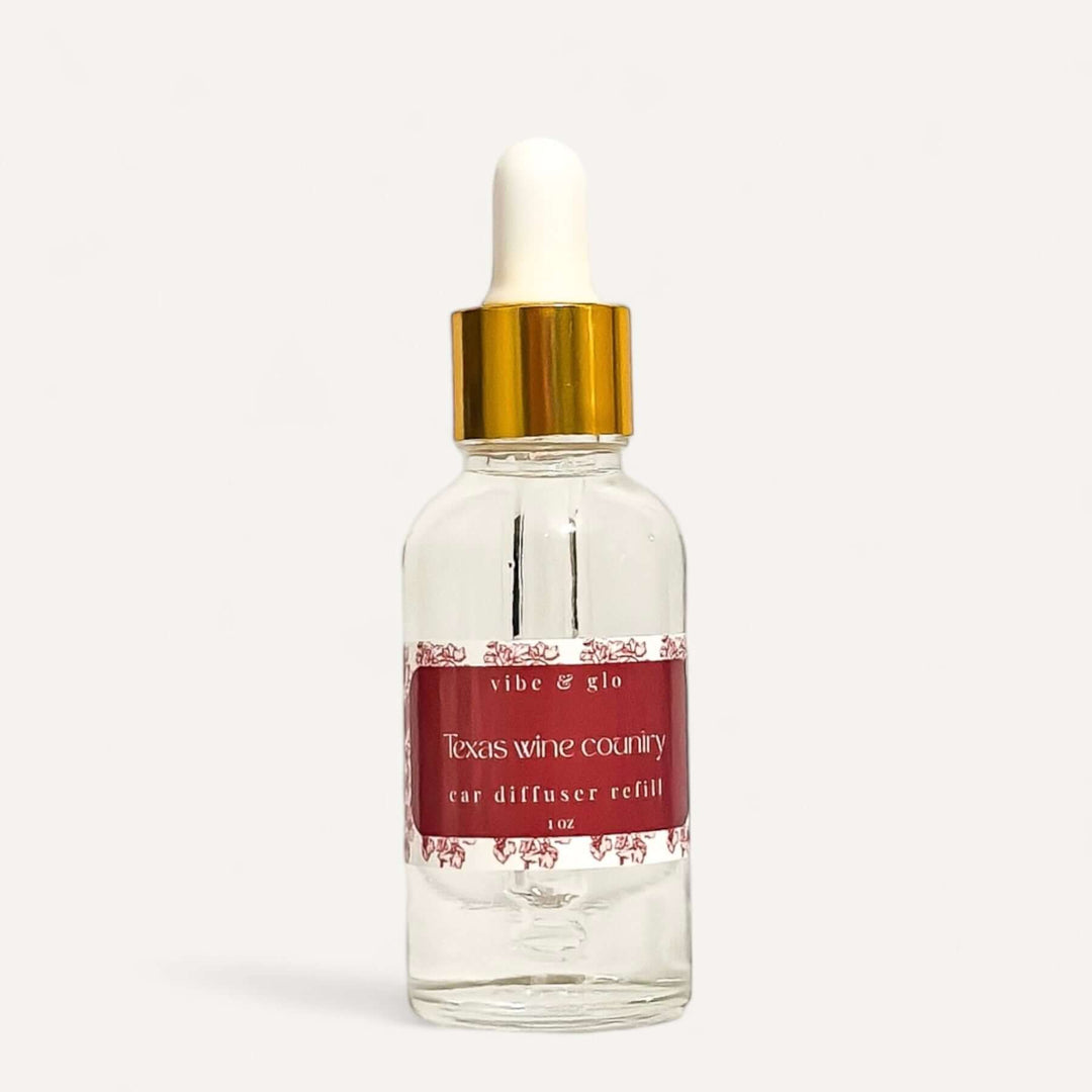 1 oz dropper bottle of Vibe & Glo Texas Wine Country car diffuser refill for lasting scent.