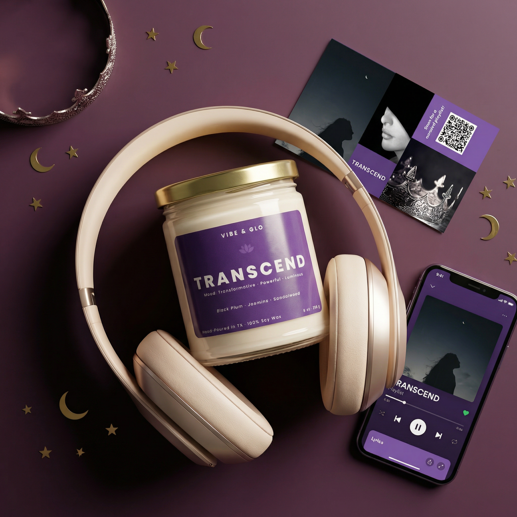 Transcend wooden wick soy candle by Vibe & Glo styled in celestial flatlay with cream headphones, mood card, gold stars, crescent moons, and playlist on smartphone.