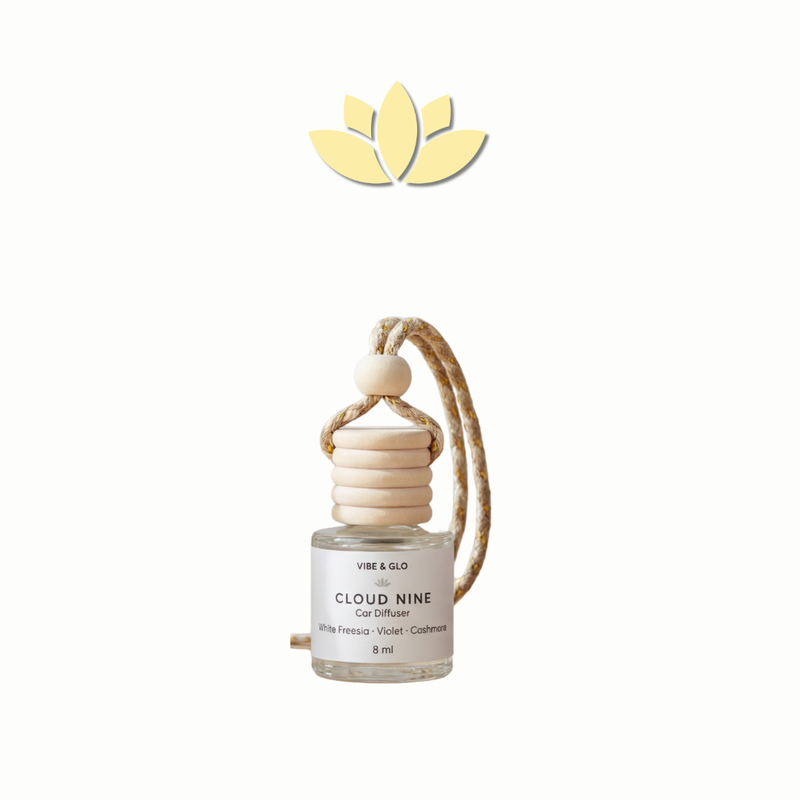 Vibe of the Month car diffuser add-on featuring Cloud Nine scent in hanging glass bottle