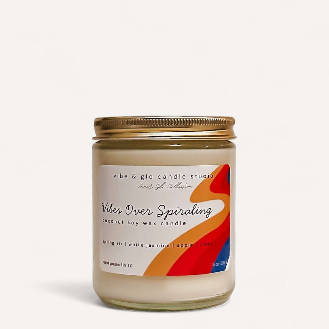  Vibes Over Spiraling coconut soy wax candle with spring air, white jasmine, and apple. Fresh, floral, fruity fragrance.